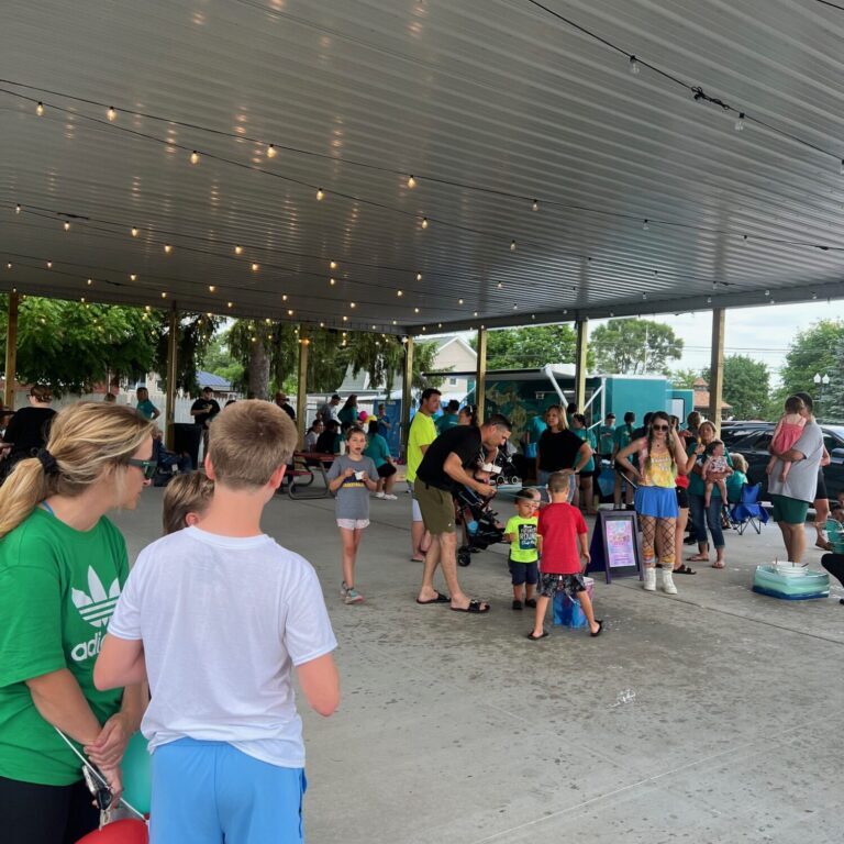 Outdoor community event with families and children
